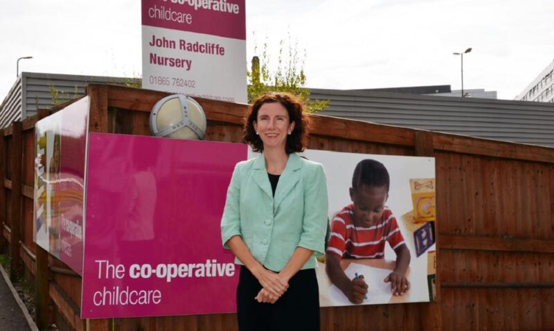 Anneliese in front of a local nursery