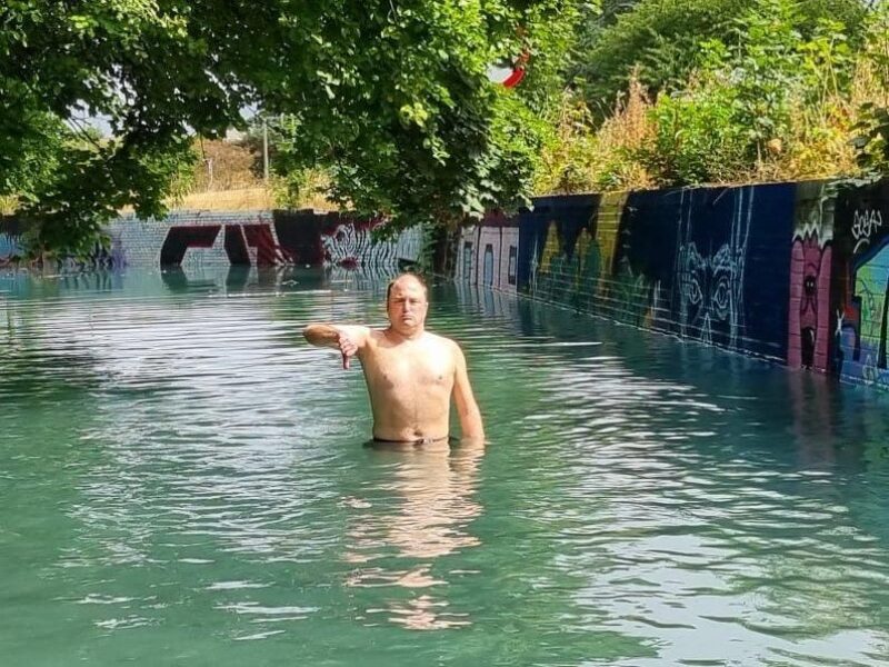 Cllr Mike Rowley, then Sheriff of Oxford and presently Deputy Lord Mayor, swimming in the flooded Littlemore Roundabout underpass four years ago